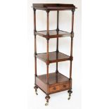 A William IV rosewood four tier what not, with base drawer, on turned legs with fitted casters,