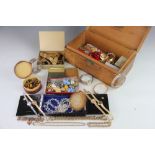 A quantity of costume jewellery to a box, to include; brooches, beads, necklaces, rings,