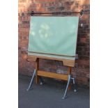 An Architects oak and metal pivoted drawing easel, 116cm W,