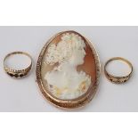 A carved shell cameo brooch within yellow metal surround,