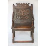 A late 17th century carved oak wainscot type chair, Lancashire / Derbyshire,