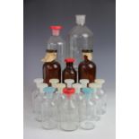 An assortment of sixty eight laboratory bottles, of small proportions with plastic stoppers,