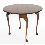 An Edwardian mahogany drop leaf occasional table, of small proportions,