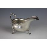 A silver sauce boat, Charles Boyton, London 1898, of typical low form,