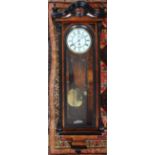 A Walnut Vienna regulator, with enamel Roman numeral dial,