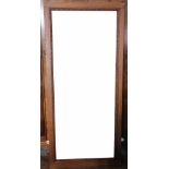 An oak dressing mirror, with bevelled plate,