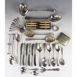 A selection of silver plated wares, to include; a ladle, basting spoon, ivorine handled knives,