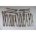 A collection of sixteen silver handled glove stretchers,