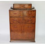 An Art Deco walnut chest, with label for Griffin & Spalding Ltd Nottingham,