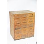 A vintage oak laboratory chest, of fifteen short drawers,