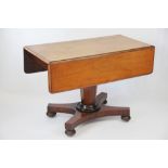 A 19th century mahogany Pembroke table, with tapered octagonal column, on platform and turned feet,