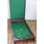 A 19th century mahogany table top bar billiards board, folding,