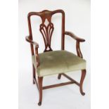 A late Victorian walnut carver dining chair,