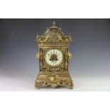 A 19th century brass eight day mantel clock,