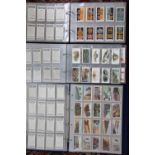 A collection of cigarette cards including examples by Players, E & W Anstie,