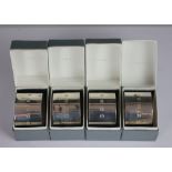 A set of four silver napkin rings, PC Ltd, London 2001, each of simple,