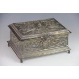 A Victorian silver plated casket, cast with arabesques and figure heads throughout,