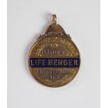 A 9ct gold and enamel Halifax N.U.F.C life member badge to P.