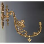 An unusual Victorian cast brass gas wall light, converted for electricity,
