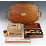 A late 19th century lacquered brass monocular microscope, in mahogany case, case 25.