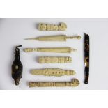 Three 19th century Indian carved bone hand seals, the larger with leopard type head terminal, 9.