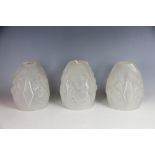 A set of three Muller Freres Luneville frosted glass light shades, moulded with fruit,