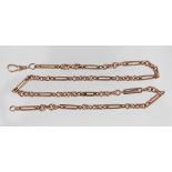 A yellow metal decorative link Albert chain, formed as lozenge and entwined knot design links,