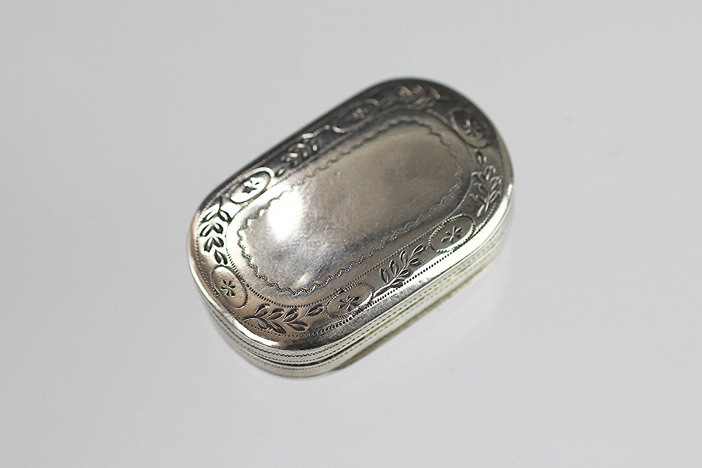 A George III silver vinaigrette, John Shaw, Birmingham 1806, of lozenge shape with foliate detail,