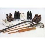A collection of vintage sport equipment, to include a pair of tan leather rugby boots,