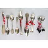 An assortment of silver flatware, to include six silver grapefruit spoons, Sheffield 1928,