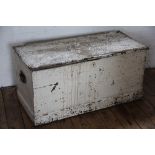 An Edwardian painted pine ships trunk, with twin loop handles,