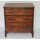 A George III mahogany chest, with brush slide above three graduated drawers, on bracket feet,