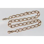 A 9ct yellow gold slender curb link chain, with two attached swivels stamped '9c', length 37cm,