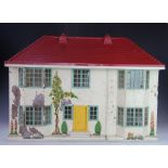 A Hamleys of London timber frame style dolls house, with hinged front elevation, 53cm,