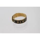 An 18ct yellow gold and black enamelled mourning ring, London 1875,