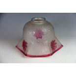 A late Victorian cranberry frosted glass light shade, of hexagonal form,