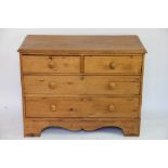 A pine chest of three graduated long drawers, on bracket feet,