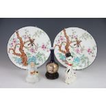 Two Mintons Bone china plates, decorated with birds, a tree and rockwork,