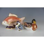 Royal Crown Derby paperweights; a duck LX, 9cm high and a duckling LXI, 7cm high,