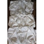 An assortment of white work undergarments and textiles