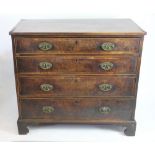 A George III inlaid mahogany chest, of four graduated long drawers with burr wood fronts,
