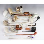 A collection of 19th century clay pipes, including one with a Jockey impressed Donovan,