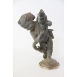 A 19th century lead fountain, modelled as a cherub with a dolphin, on octagonal base,