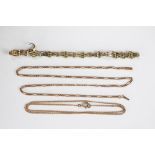 A yellow metal decorative link chain with barrel snap clasp stamped '15', weight 6gms,