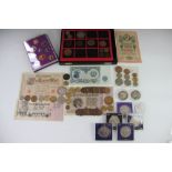 A collection of coins and bank notes including copper pennys,