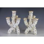 An unusual pair of Copeland four section specimen vases,