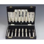 A cased set of silver and mother of pearl handled fruit knives and forks, Travis Wilson & Co Ltd,