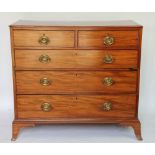 A Regency cross-banded mahogany chest, of two short and three graduated long drawers,