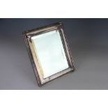 A silver framed mirror, Walker and Hall, Birmingham 1925,