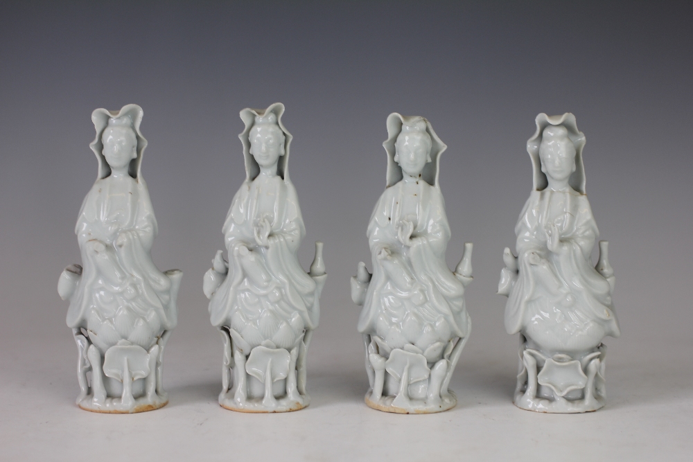 Four Chinese porcelain blanc de chine figures of Guan Yin,